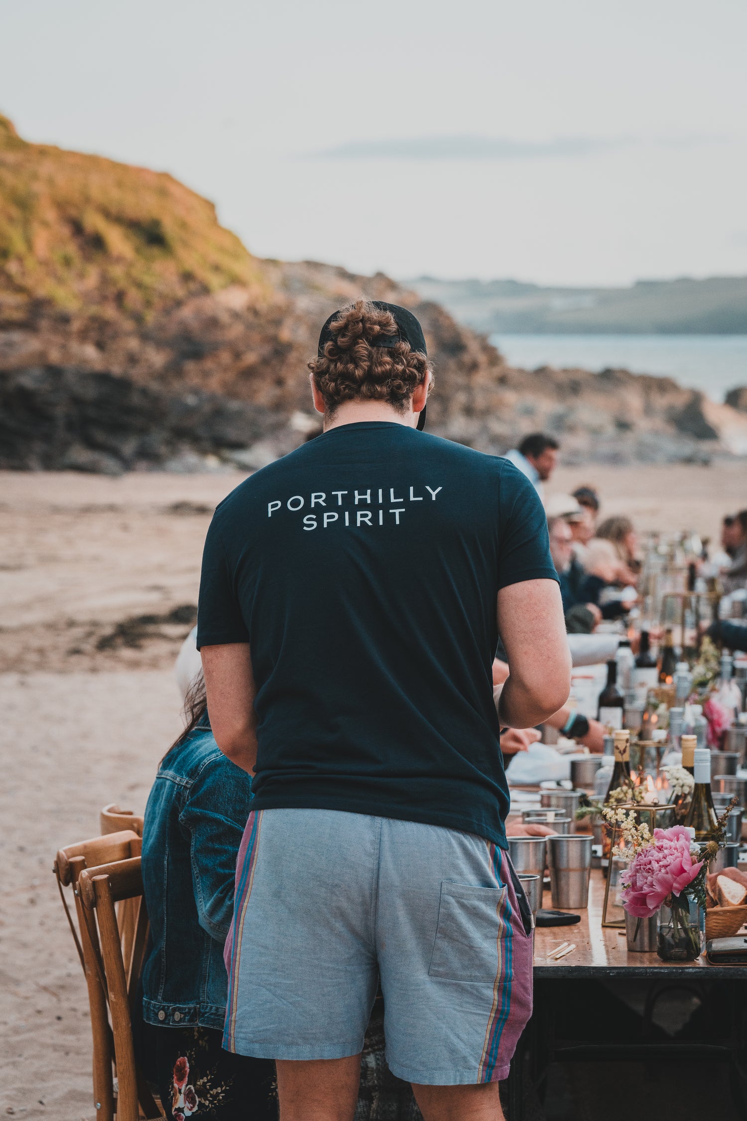 Navy Porthilly Spirit t-shirt on the beach